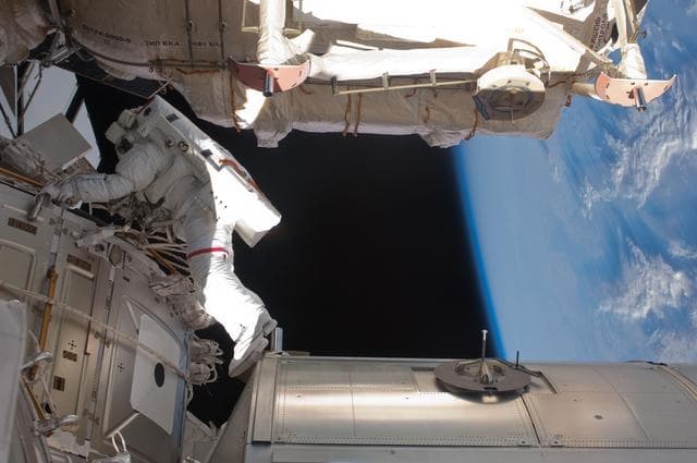 NASA image: View of STS-134 MS Feustel working during EVA-3