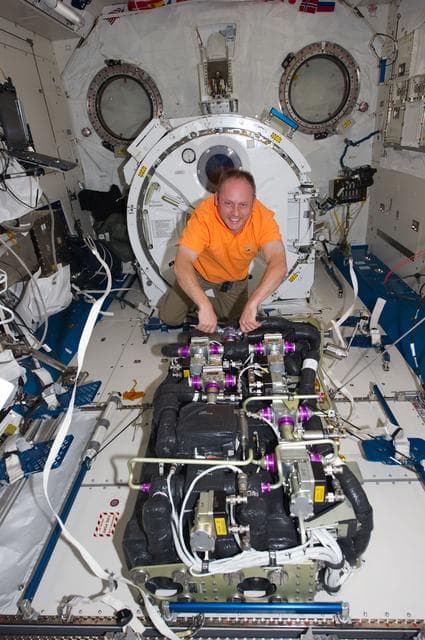 NASA image: View of STS-134 MS Fincke working on the CDRA