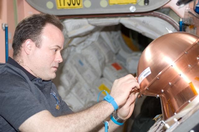 NASA image: Expedition 28 FE Garan prepares the REBR for Installation in the ATV-2