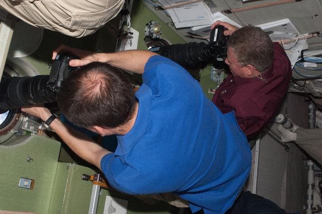 NASA image: View of Expedition 28 Crew Members photographing the Shuttle Atlantis during Approach