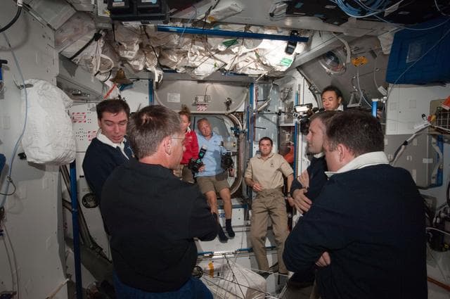 NASA image: View of Expedition 28 Crew Members greeting the STS-135 Crew