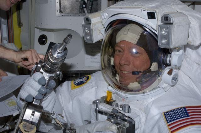 NASA image: View of Expedition 28 FE Fossum preparing for a session of EVA