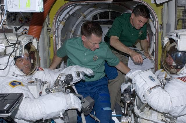 NASA image: Expedition 28 and STS-135 Crew Members prepare for EVA