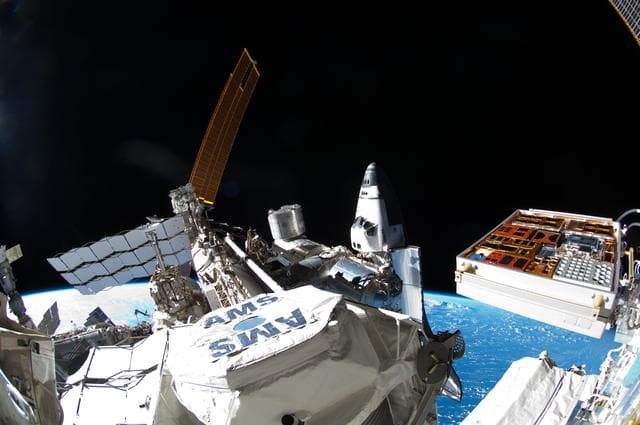 NASA image: Exterior view of ISS taken with a Fisheye Camera during EVA
