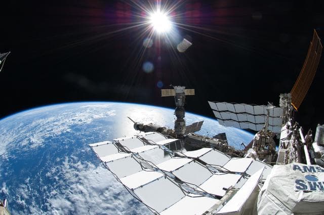 NASA image: Exterior view of ISS taken with a Fisheye Camera during EVA