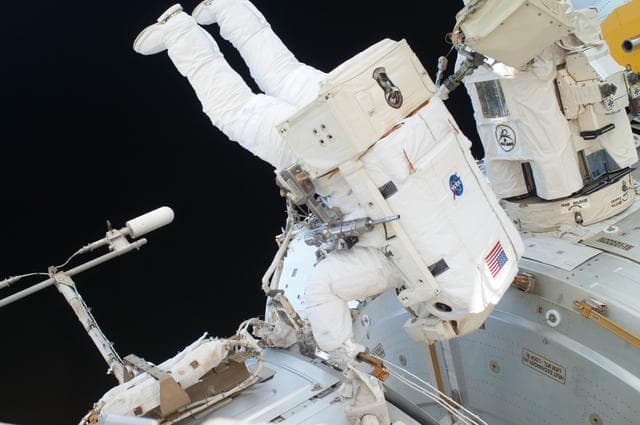 NASA image: View of FE Garan taken during a session of EVA