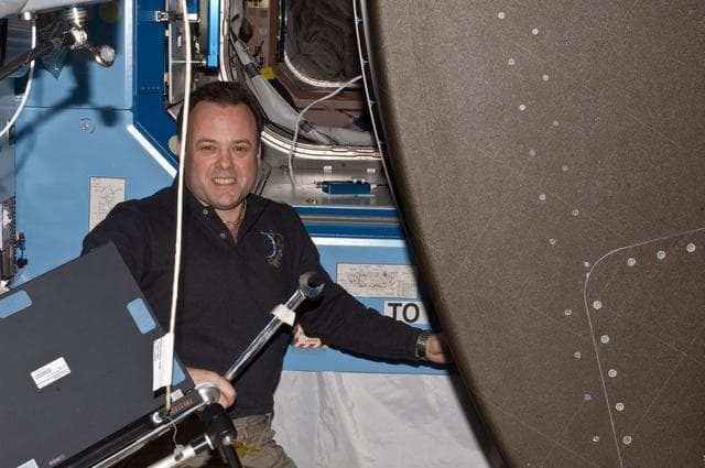 NASA image: Expedition 28 FE Garan poses for a photo in the US Lab