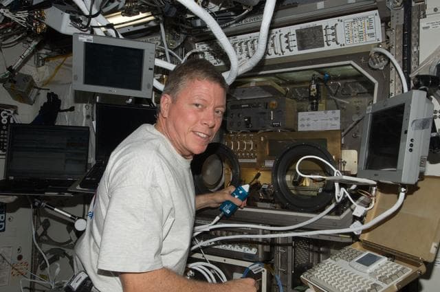 NASA image: View of FE Fossum working with SHERE