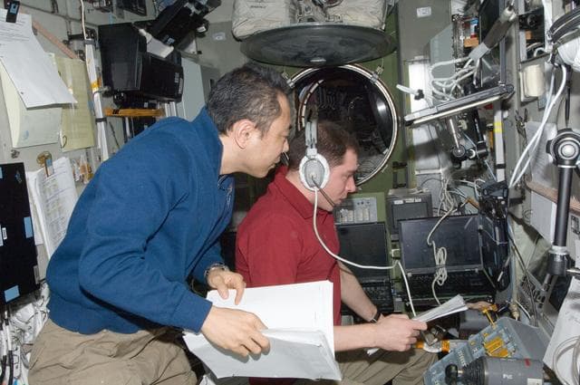 NASA image: Volkov and Furukawa during Progress 45 docking with ISS