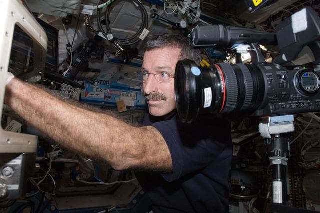 NASA image: Burbank works at the LMM in the FIR/FCF in the U.S. Laboratory