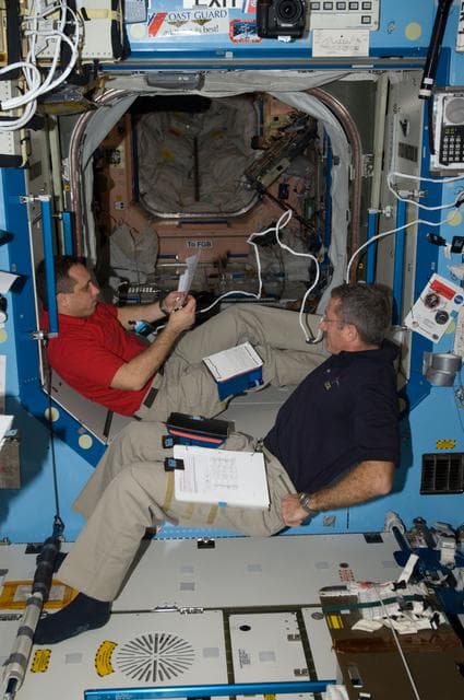 NASA image: Burbank and Shkaplerov work in the U.S. Laboratory