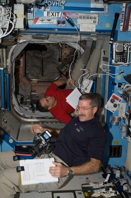NASA image: Burbank and Shkaplerov work in the U.S. Laboratory