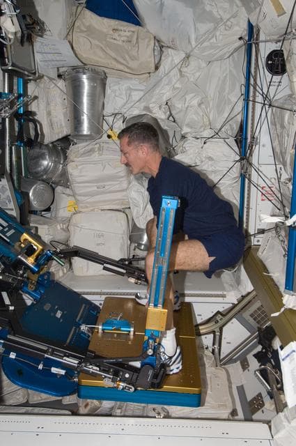 NASA image: Burbank exercises using the ARED in the Node 3