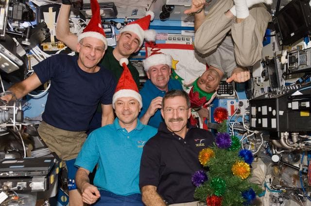 NASA image: Expedition 30 Crew Members celebrate Christmas in the U.S. Laboratory