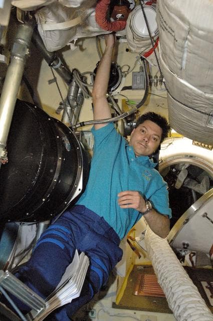 NASA image: Kononenko installs and prepares equipment for KPT-21 PK-3+ Plasma Crystal-3+ Telescience