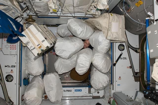 NASA image: Trash and Excessed Equipment at the Node 2 FWD End Cone
