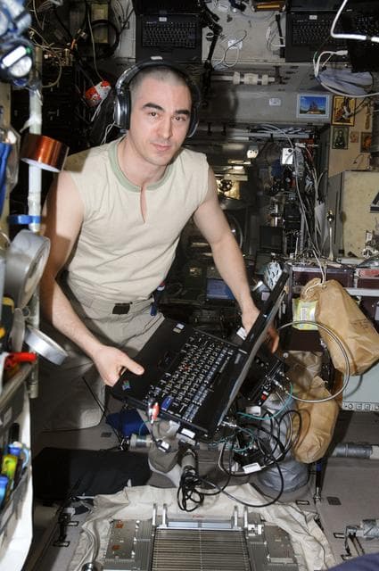 NASA image: Ivanishin wearing a communication system headset in the SM