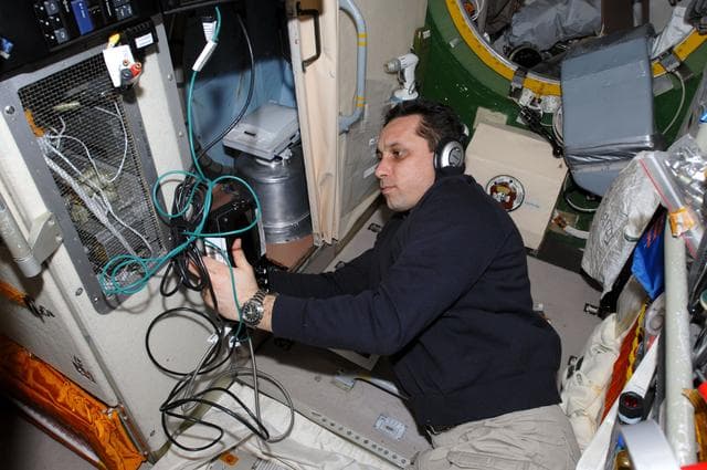 NASA image: Shkaplerov uses a Video Display Unit in the SM