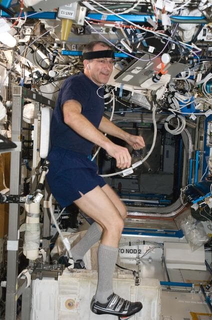 NASA image: Pettit exercises on the CEVIS