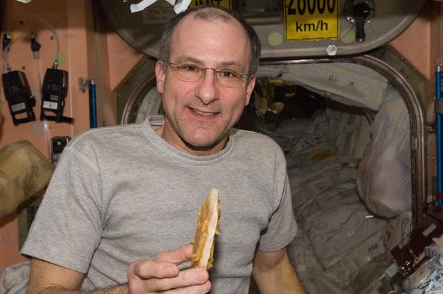 NASA image: Pettit enjoys snack in the Node 1
