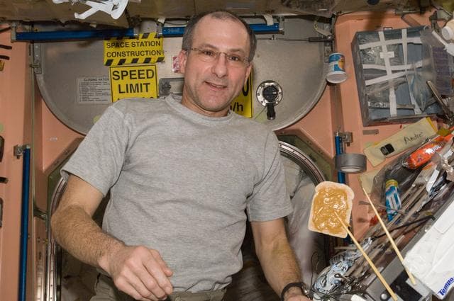 NASA image: Pettit enjoys snack in the Node 1