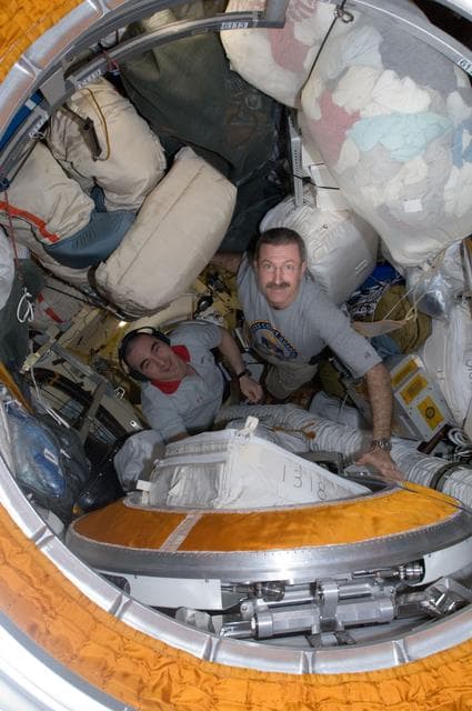 NASA image: Burbank and Ivanishin prepare for EVA Session