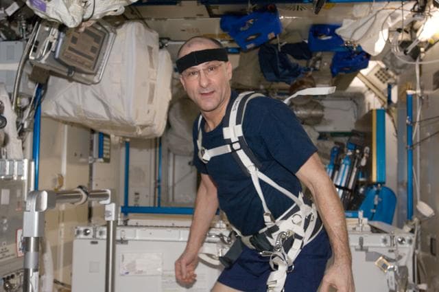 NASA image: Pettit prepares to exercise on the COLBERT in the Node 3