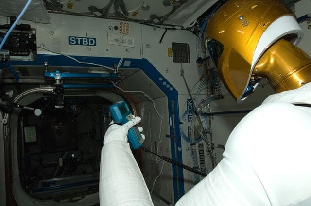 NASA image: Robonaut 2 Humanoid Robot measures the air velocity in the U.S. Laboratory