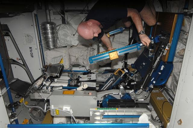 NASA image: Kuipers sets up the ARED in the Node 3