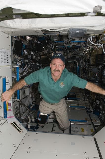 NASA image: Burbank between the hatch area of U.S. Laboratory and Node 1