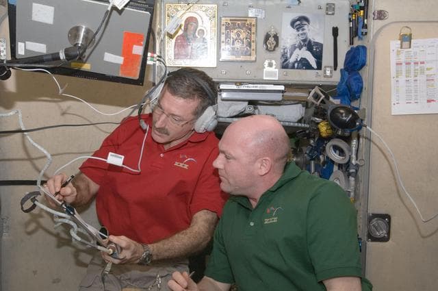 NASA image: Burbank and Kuipers review crew procedures