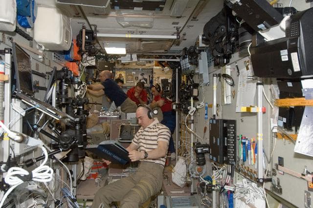 NASA image: Expedition 30 crewmembers in the SM