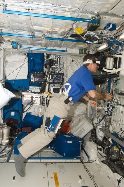 NASA image: Burbank uses the Neurospat hardware in the Columbus Module