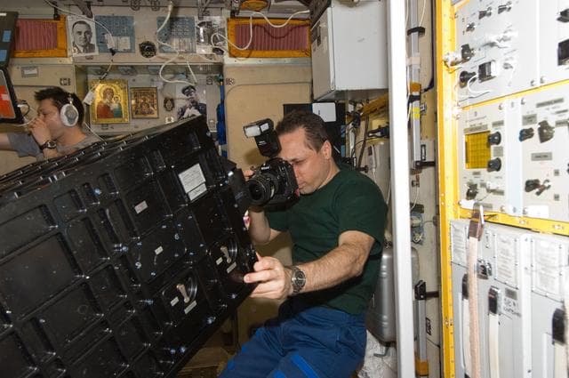 NASA image: Shkaplerov uses a still camera for photo documentation of the PCE