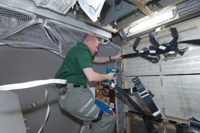 NASA image: Kuipers uses drill in the ATV-3