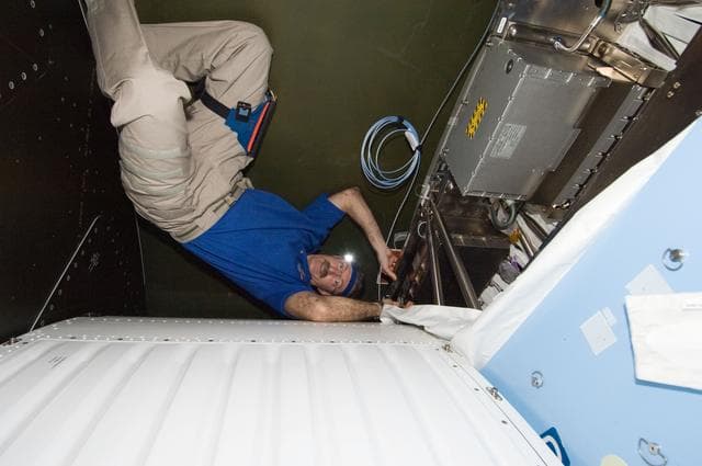 NASA image: Burbank working on the MDM16C Assembly in the U.S. Laboratory