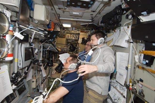 NASA image: Expedition 30 crewmembers use TORU Docking System Controls
