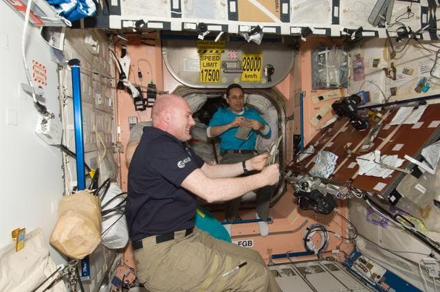 NASA image: Kuipers and Shkaplerov enjoy a meal in the Node 1