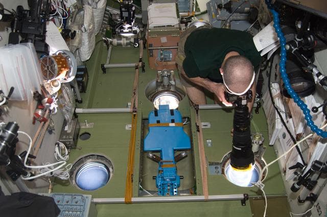 NASA image: Pettit Uses a Camera in the SM