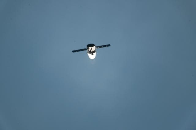 NASA image: Dragon Spacecraft during Flyunder Operations