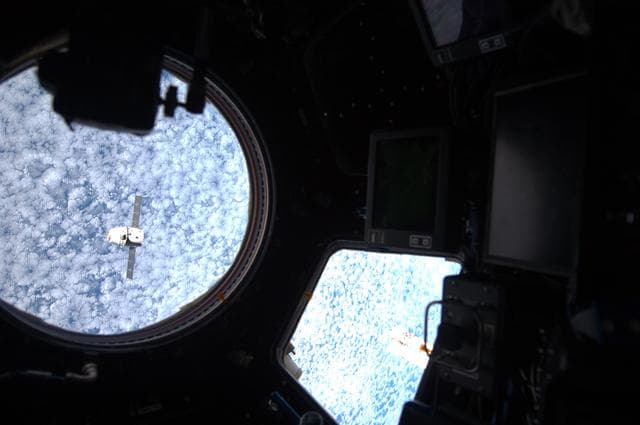 NASA image: Dragon Spacecraft on Approach as seen through Cupola Window