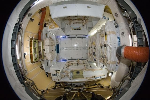 NASA image: Fisheye View of Dragon interior following Hatch Opening