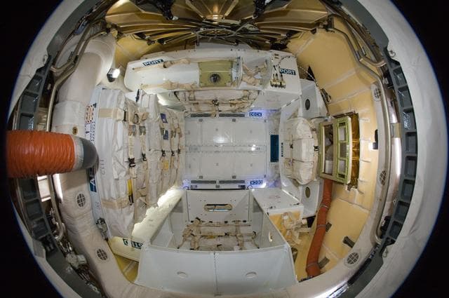 NASA image: Fisheye View of Dragon interior following Hatch Opening