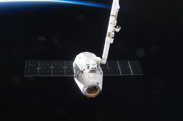 NASA image: Unberthed Dragon grappled by SSRMS