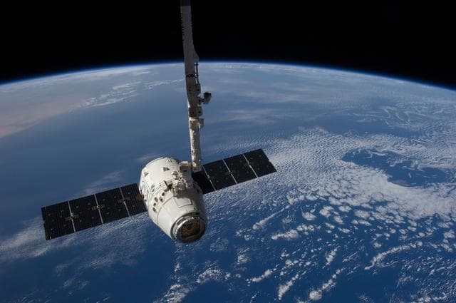 NASA image: Unberthed Dragon grappled by SSRMS
