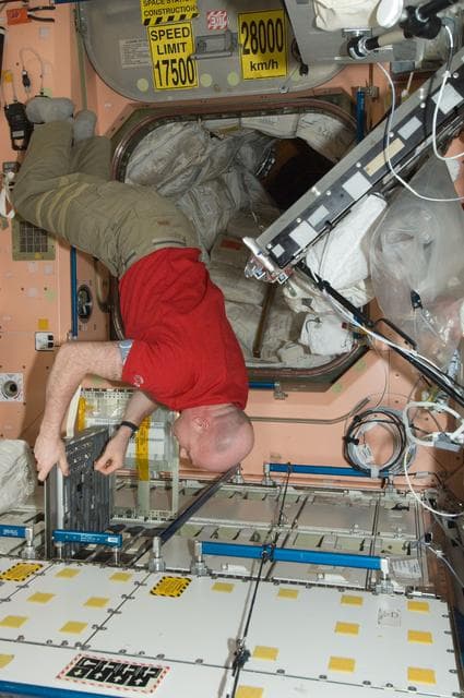 NASA image: Kuipers works with IVA Toolbox in Node 1