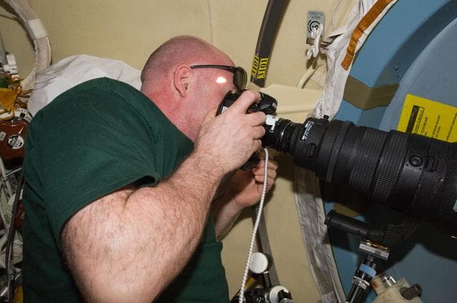 NASA image: Kuipers photographs the Transit of Venus from window in DC1
