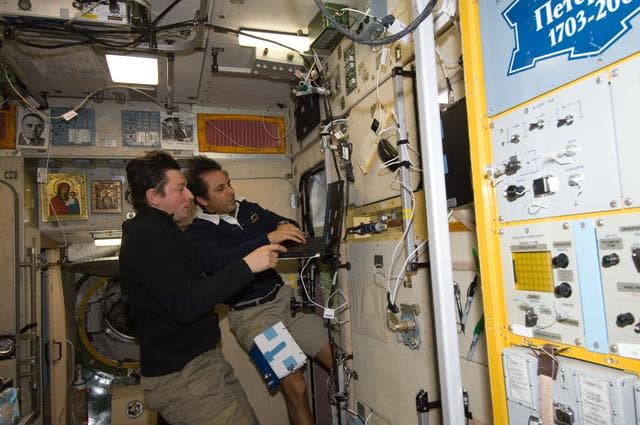 NASA image: Expedition 32 Crew Members work in the SM