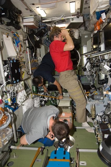 NASA image: Expedition 32 Crew Members work in the SM