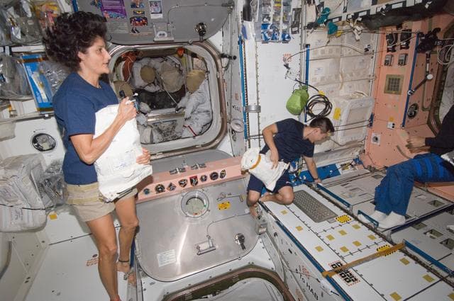 NASA image: Expedition 32 Crew Members working in the Node 1
